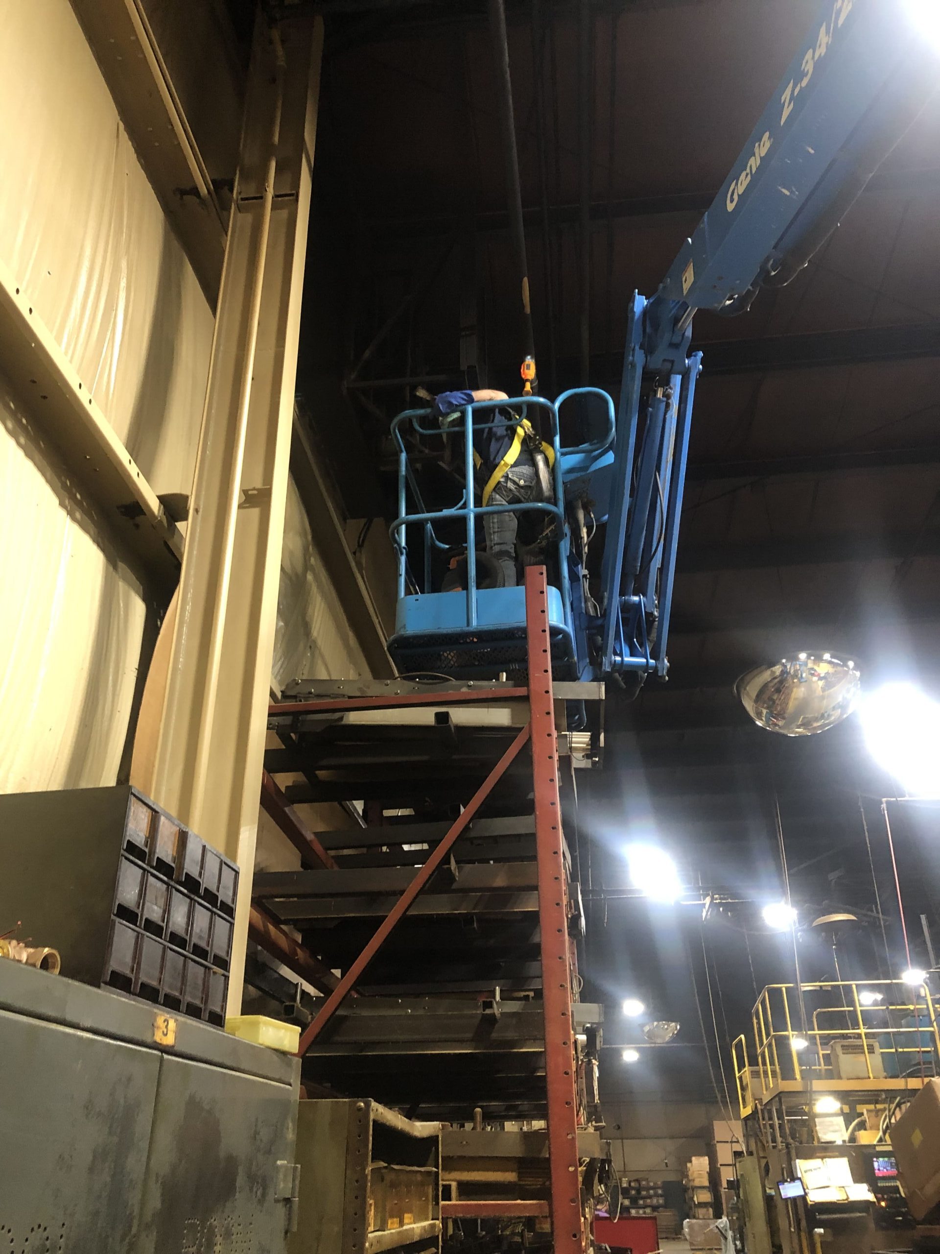 High industrial ceiling being prepared for cleaning