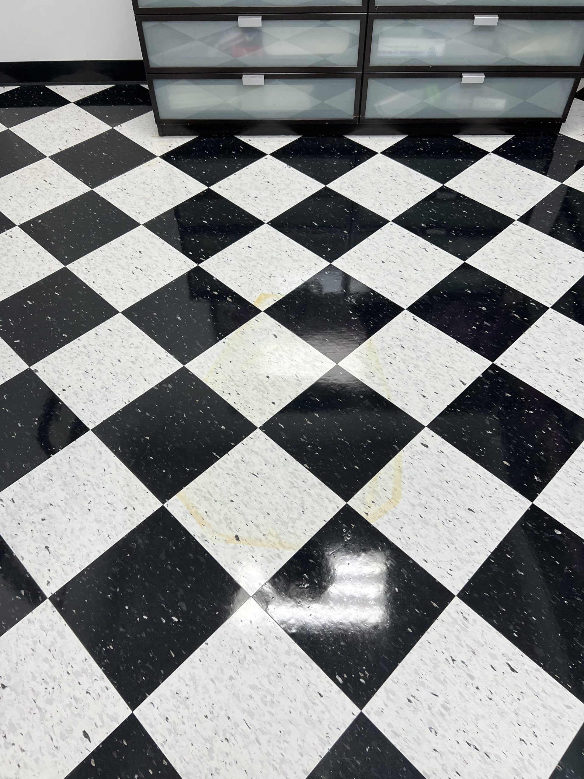 Newly cleaned checkered Vinyl Floor Tile